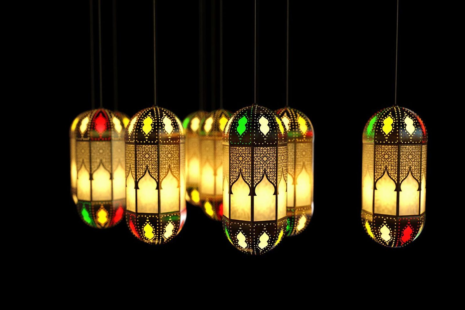 Lanterns glowing at an evening Ramadan gathering, the setting for Ramadan event staff at an iftar